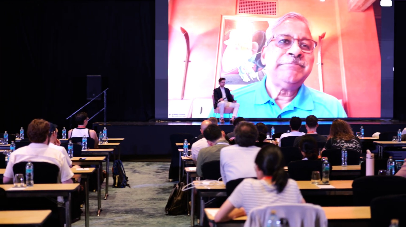 Ram Shriram speaking to the founder community over video at a live event